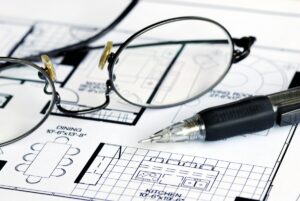 Glasses on Blueprint Floorplan Closeup