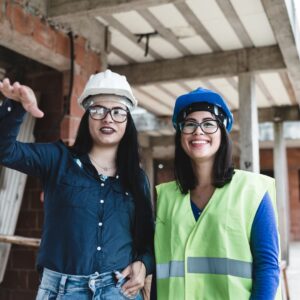 construction workers discussing building project