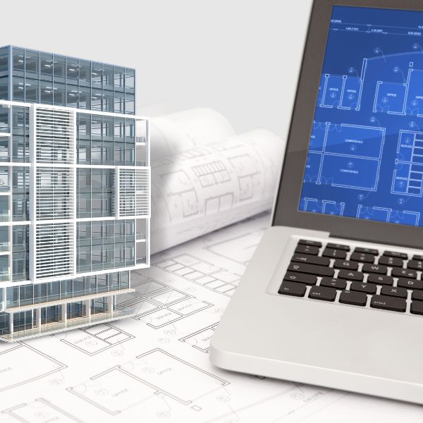 architectural CAD program on laptop with 3D rendering